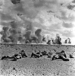 1942-43-El Alamein battle with Australian soldiers crawling accross the ground.